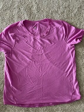 Lululemon Women's Pink Short-Sleeve Active Top. Size 10